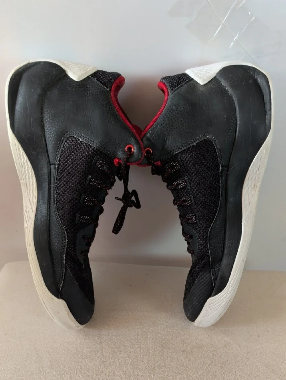Jordan Men’s Black and Red High-Top Athletic Basketball Shoes.